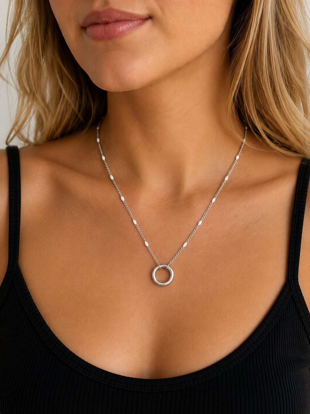 Woman wearing the DUGO silver Enamel Spring Gate Clasp Necklace