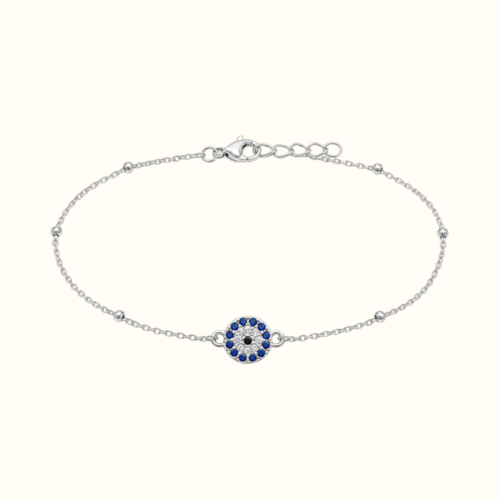 DUGO silver-tone stainless steel bracelet featuring a blue and white evil eye charm with delicate bead accents.