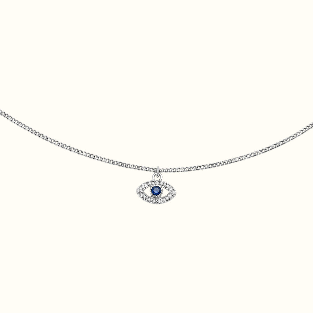 DUGO delicate silver evil eye bracelet with a blue zirconia center stone and sparkling clear crystal accents