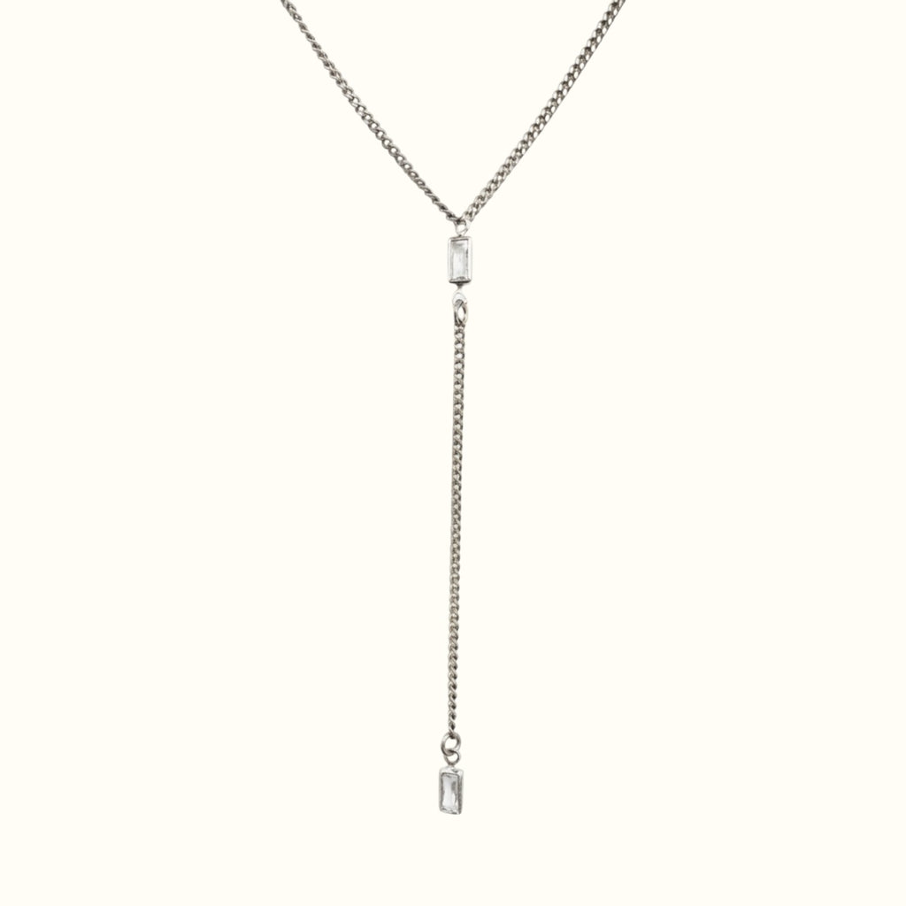 DUGO silver-tone lariat Y necklace featuring a thin Cuban chain and two clear baguette-cut cubic zirconia stones.