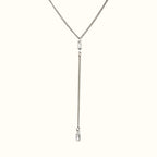 DUGO silver-tone lariat Y necklace featuring a thin Cuban chain and two clear baguette-cut cubic zirconia stones.