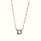 DUGO silver-tone stainless steel lip chain necklace with a round carabiner spring ring clasp centerpiece.