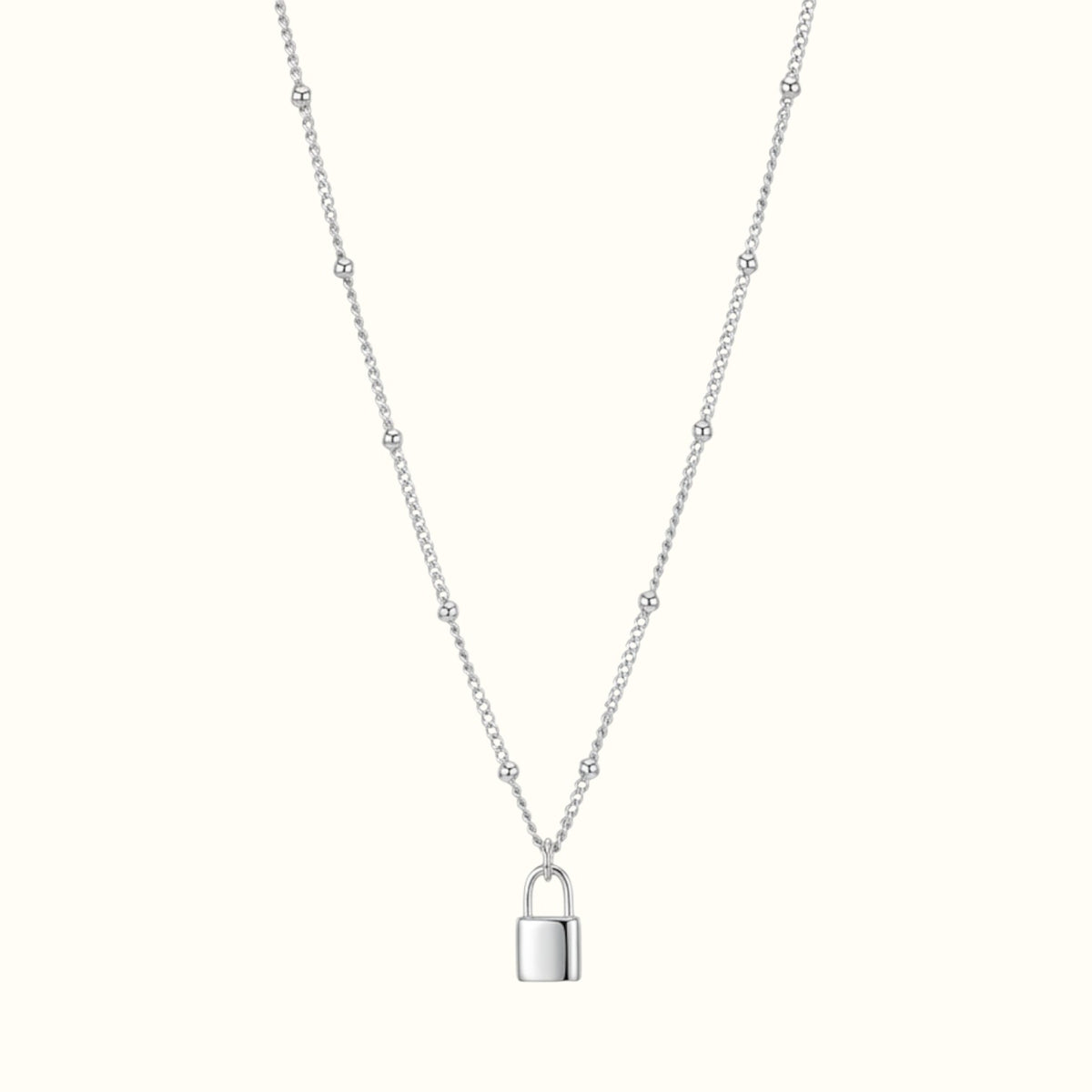 DUGO silver lock pendant necklace on a delicate ball chain, waterproof and tarnish-resistant minimalist jewelry.