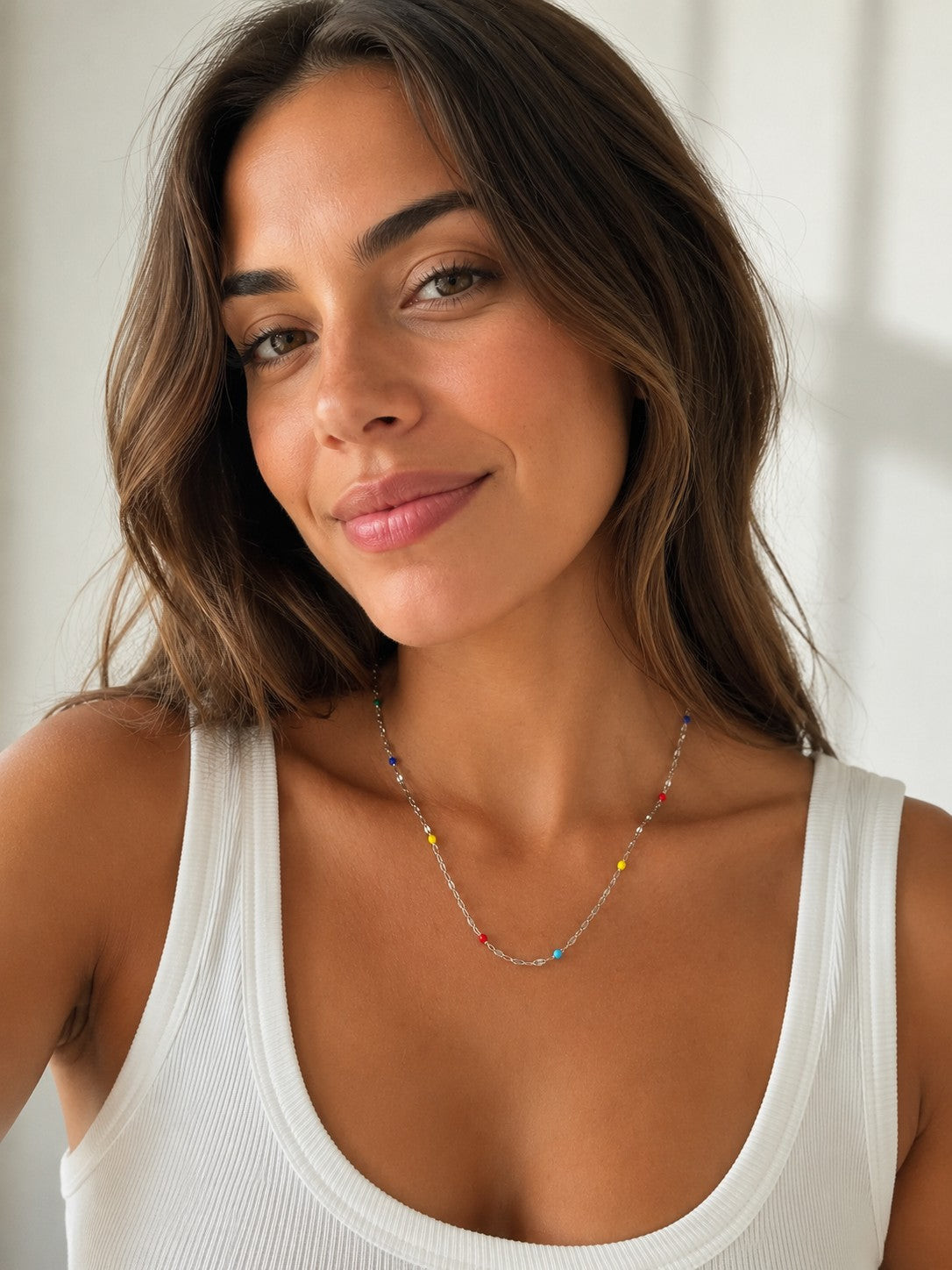 Close-up of the DUGO silver Multicolor Enamel Chain Necklace worn on the neck