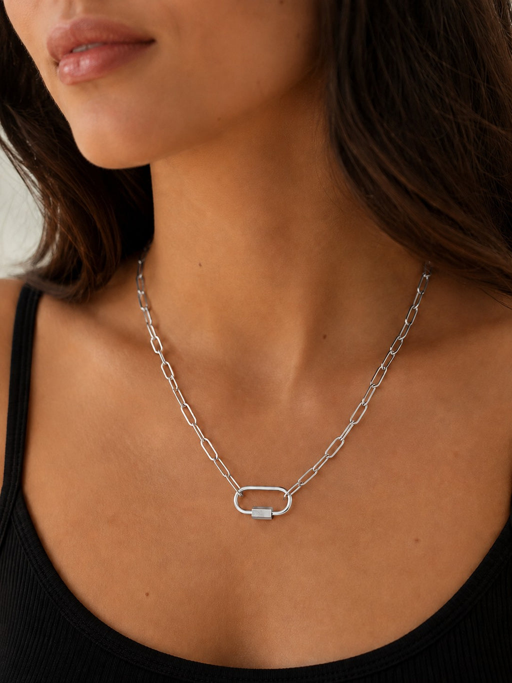 Woman wearing the DUGO silver Oval Carabiner Thick Paperclip Chain Necklace