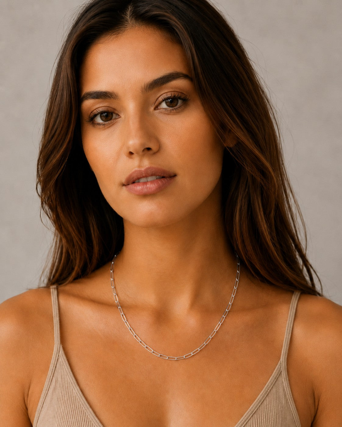 Close-up of the DUGO silver Paperclip Chain Necklace worn on the neck