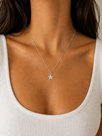 Woman wearing the DUGO silver Pave Starfish Pendant Necklace