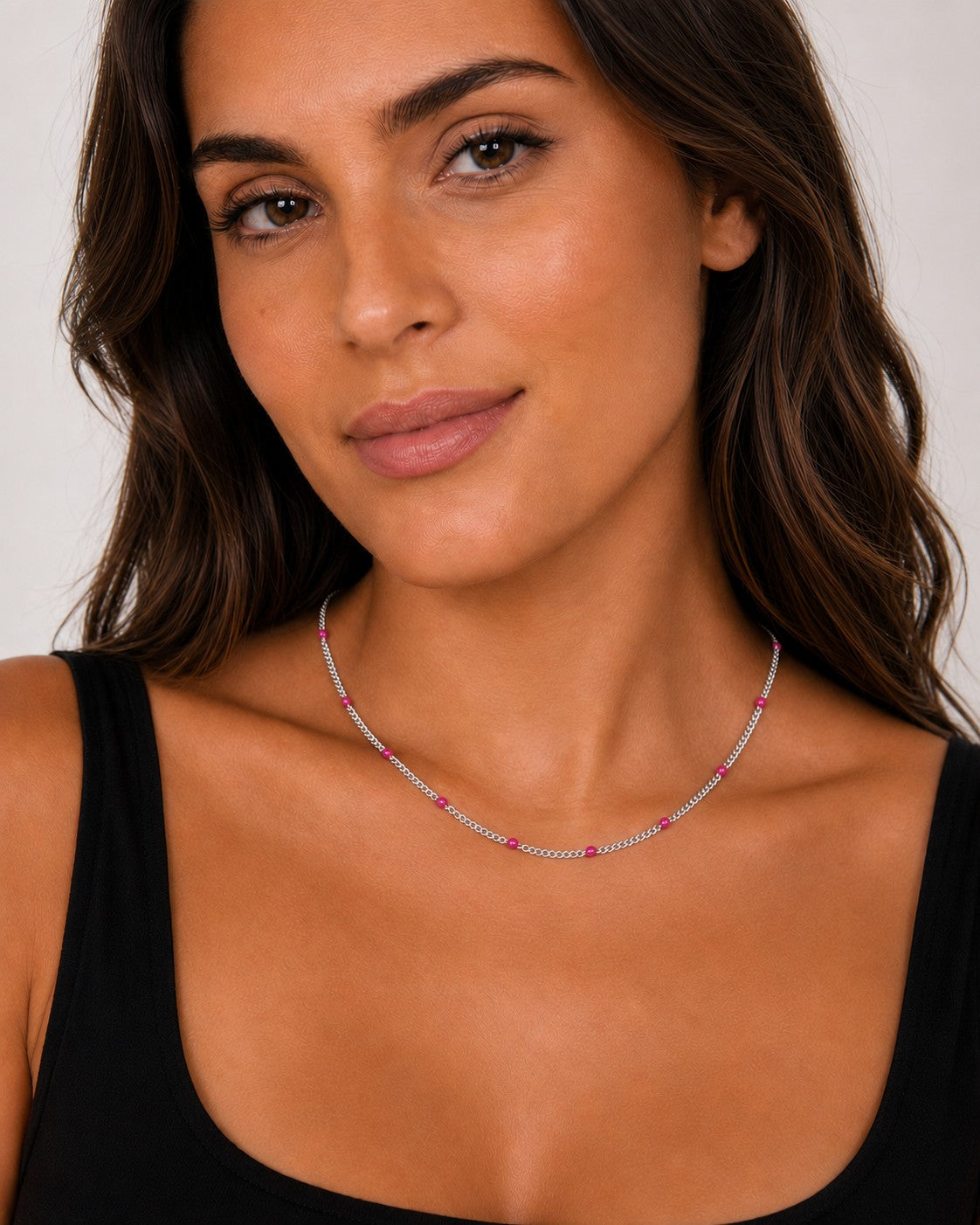 Close-up of the DUGO silver pink Enamel Curb Chain Necklace worn on the neck