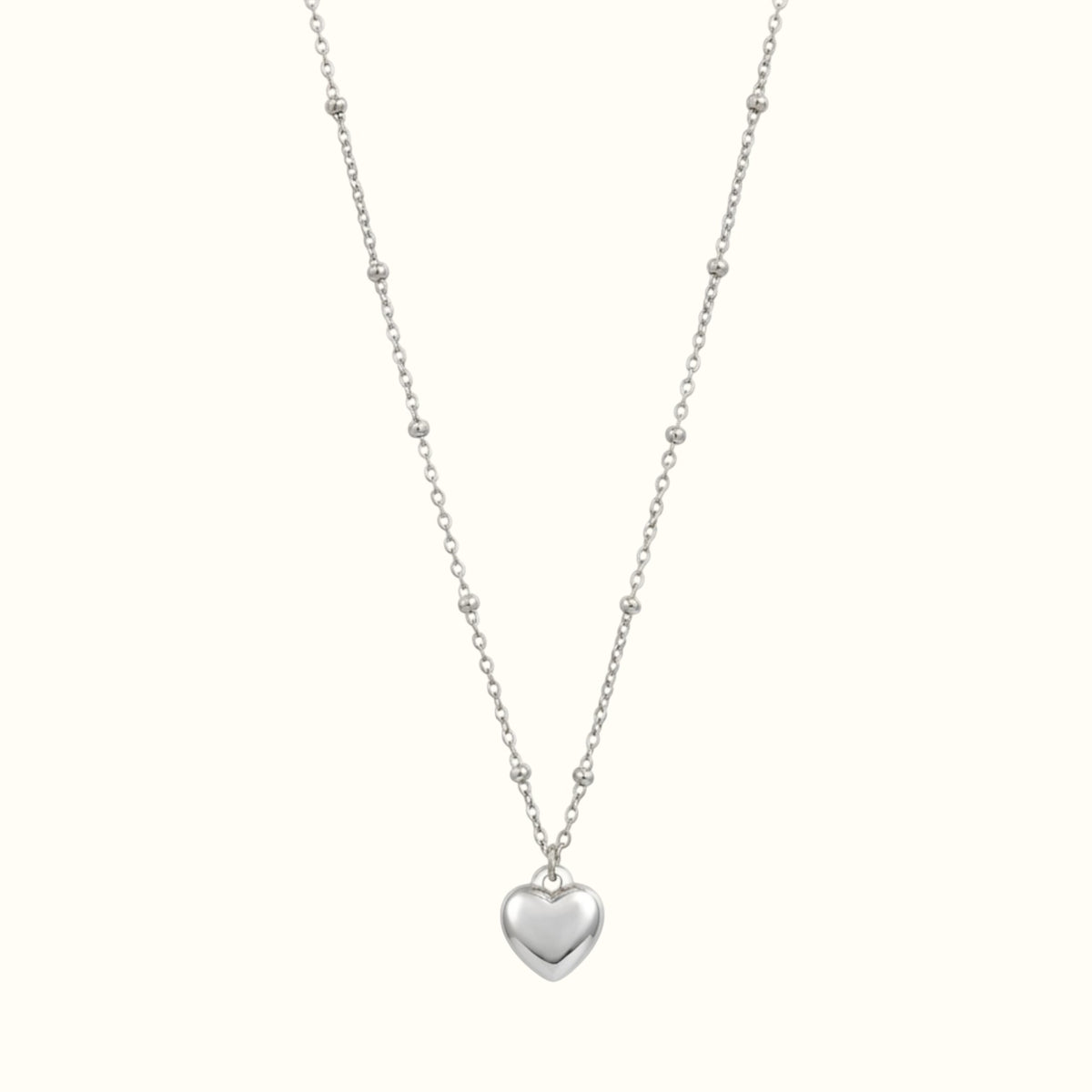 DUGO silver puffy heart pendant necklace on a delicate ball chain, waterproof and tarnish-resistant jewelry.