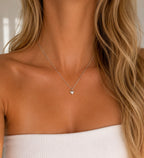 Woman wearing the DUGO silver Puffy Heart Pendant Necklace