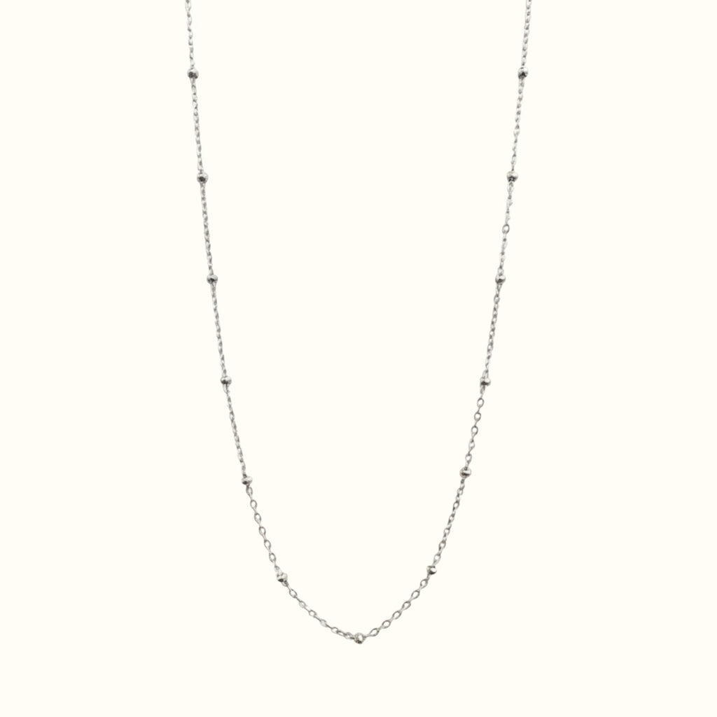 DUGO minimalist satellite bead necklace in silver stainless steel with a delicate chain and lobster clasp
