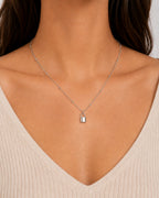 Woman wearing the DUGO silver Satellite Chain Padlock Necklace