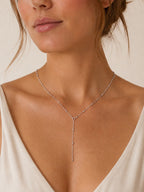 Woman wearing the DUGO silver Satellite Chain Y Lariat Necklace