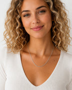 Close-up of the DUGO silver Textured Oval Link Chain Necklace worn on the neck