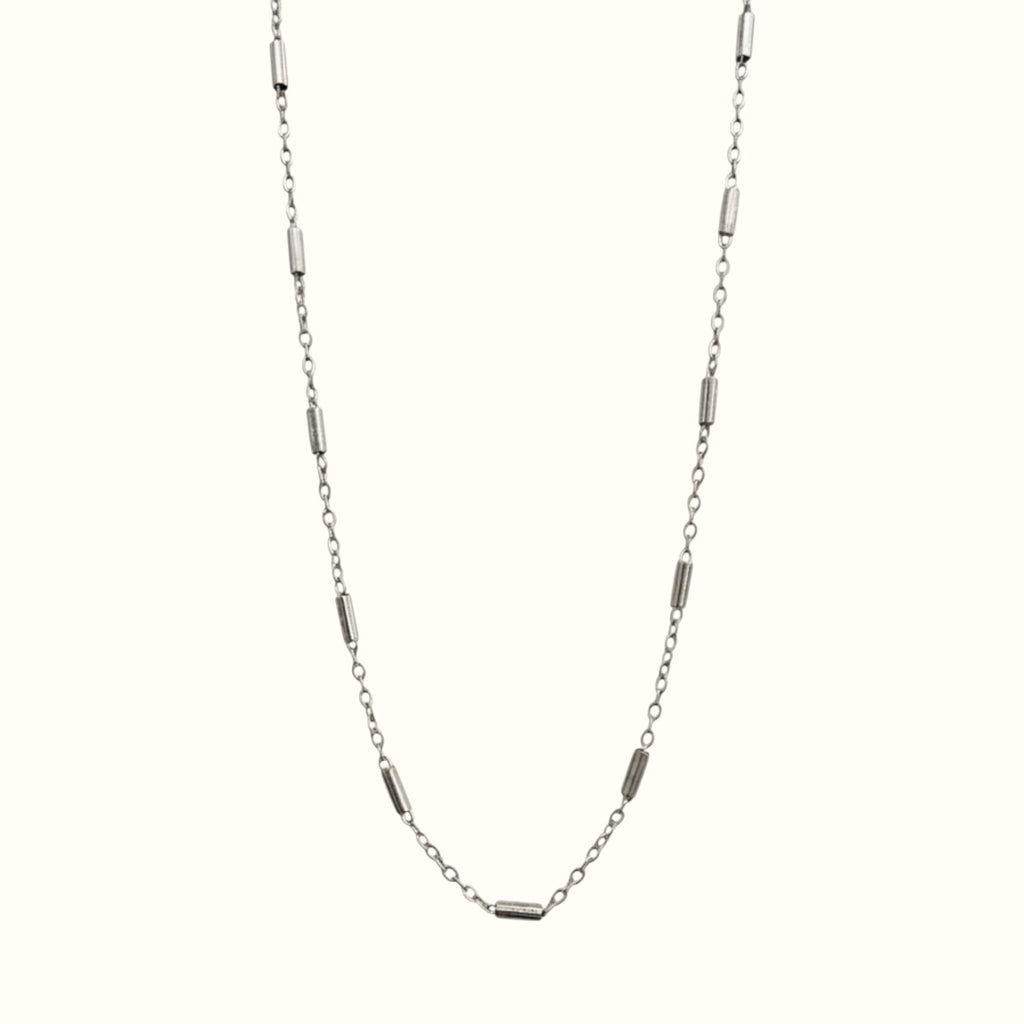 DUGO minimalist silver-tone tube cable chain necklace made of durable stainless steel for everyday wear.