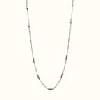 DUGO minimalist silver-tone tube cable chain necklace made of durable stainless steel for everyday wear.