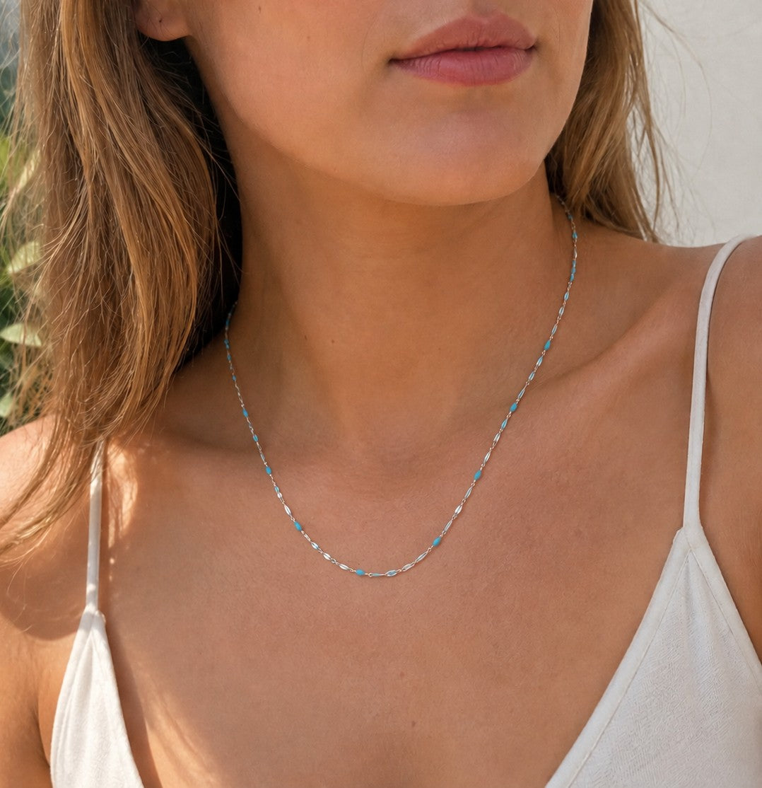 Woman wearing the DUGO silver turquoise Enamel Lip Chain Necklace