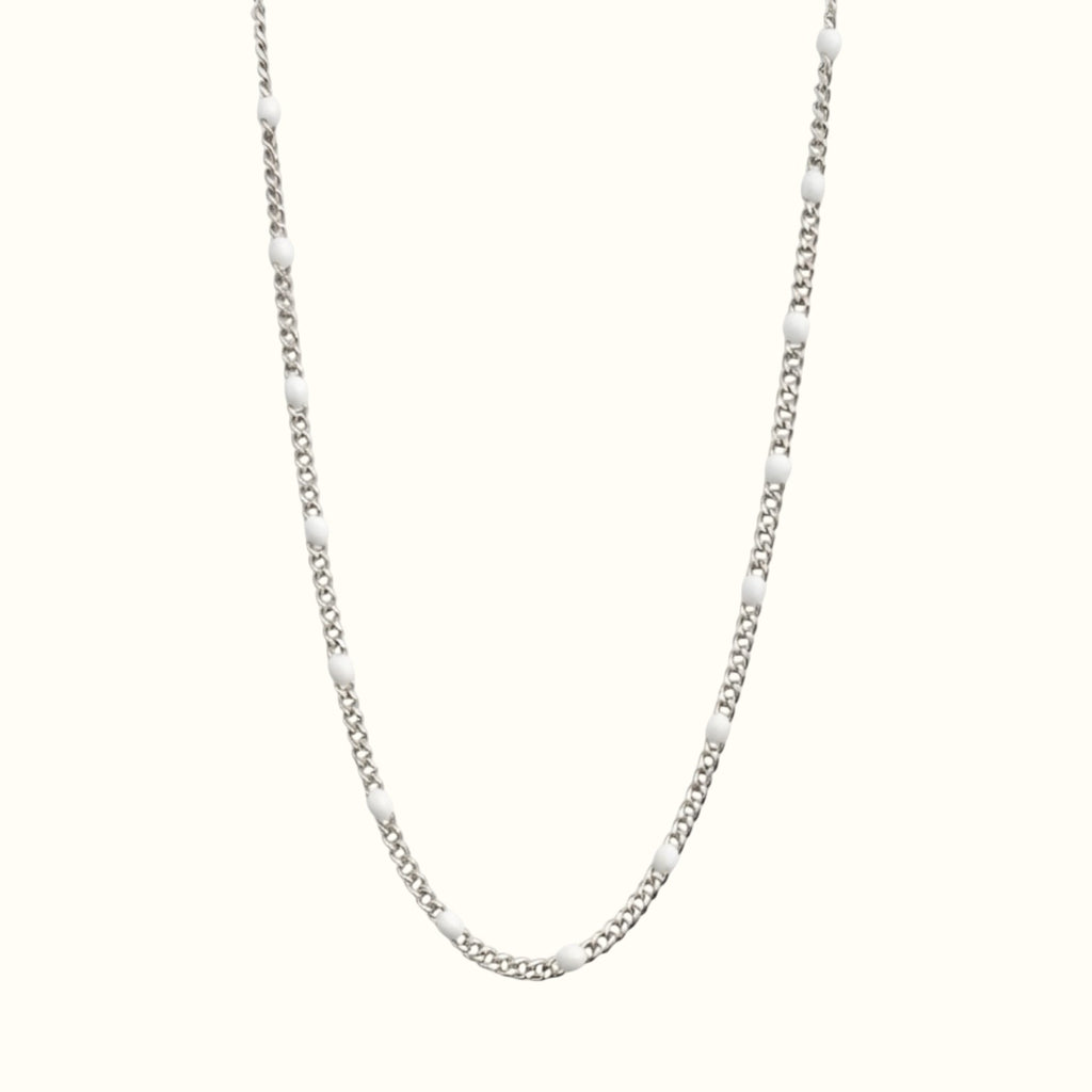DUGO silver curb chain necklace featuring small white enamel beads, crafted from tarnish-resistant stainless steel.