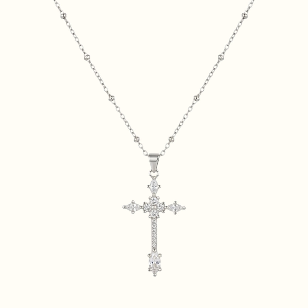 DUGO silver ball chain necklace featuring a delicate cross pendant adorned with sparkling white zirconia stones