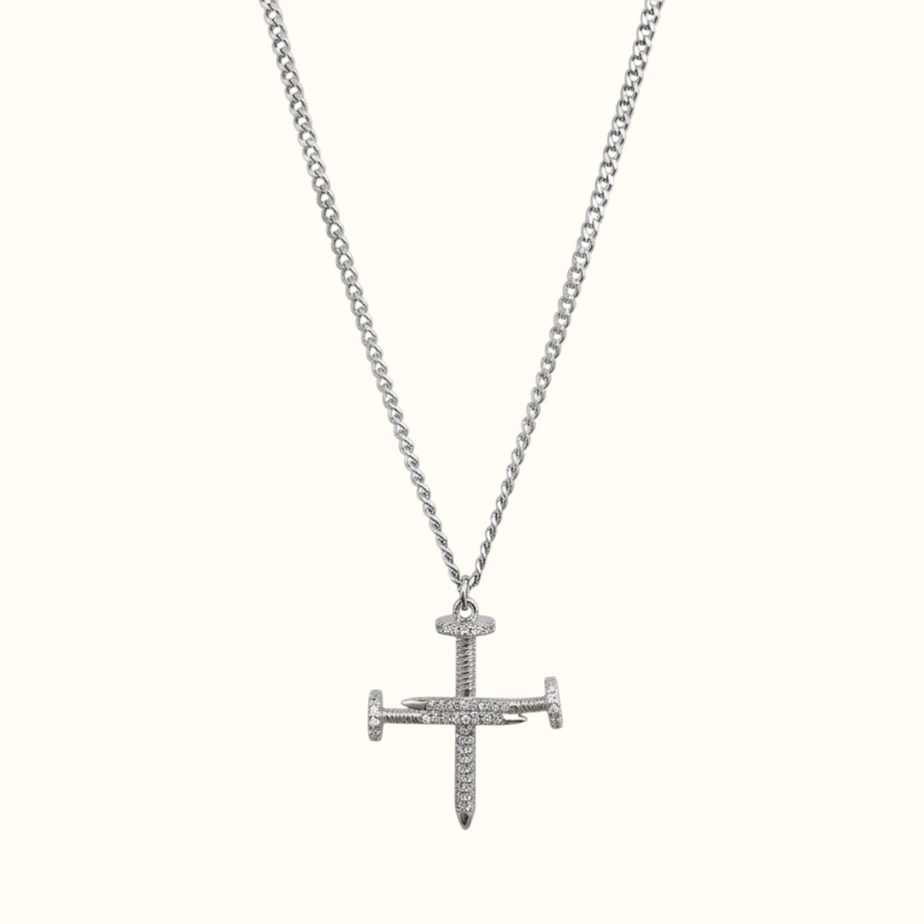 DUGO silver cross nail pendant necklace featuring sparkling zirconia stones on a delicate curb chain