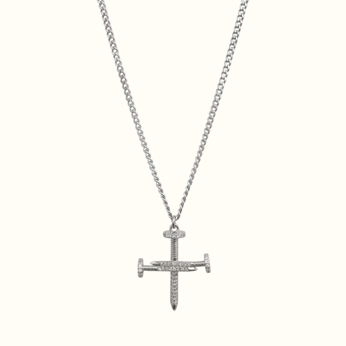 DUGO silver cross nail pendant necklace featuring sparkling zirconia stones on a delicate curb chain