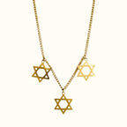 DUGO Star David Classic Trio necklace featuring three gold-toned Star of David pendants on a delicate chain
