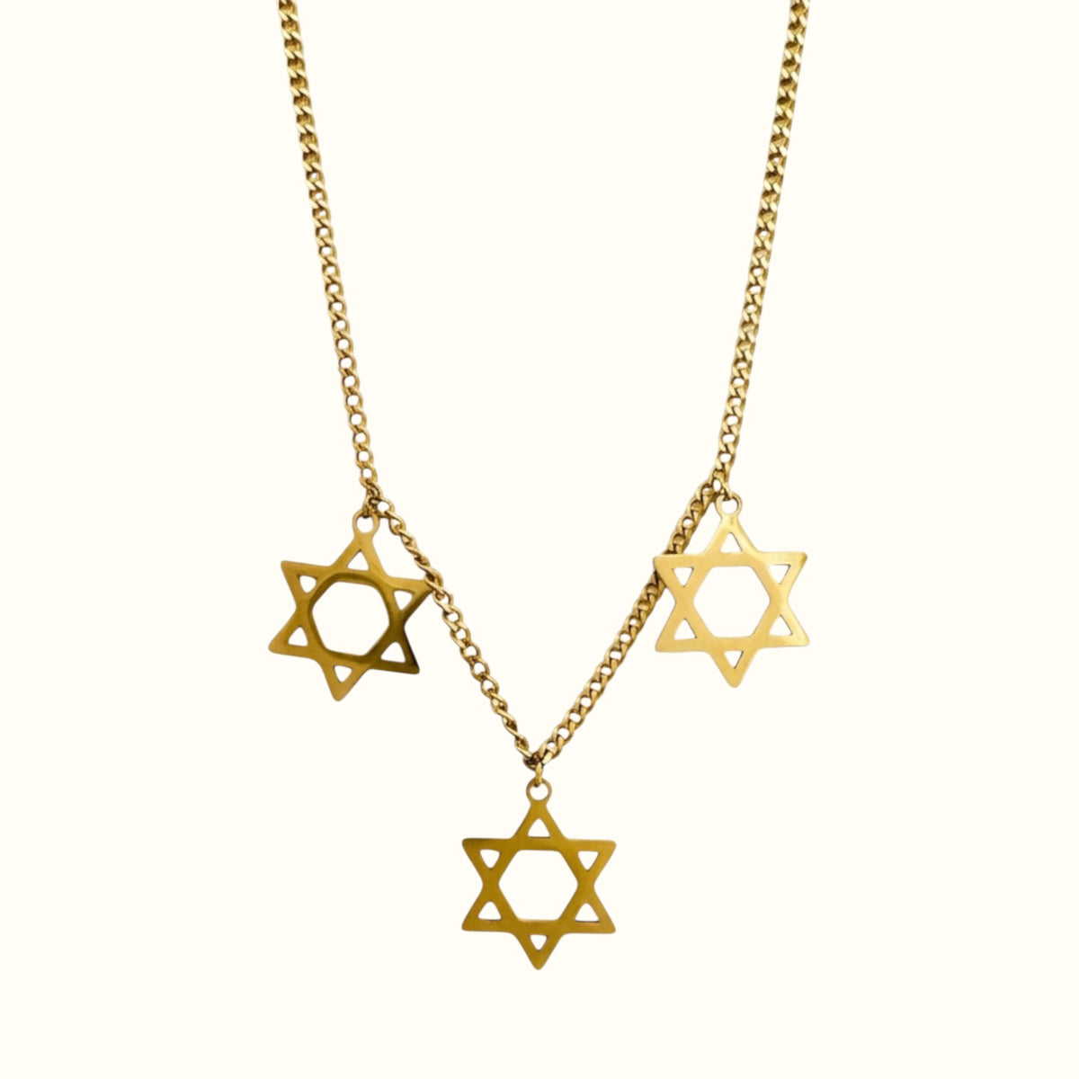 DUGO Star David Classic Trio necklace featuring three gold-toned Star of David pendants on a delicate chain