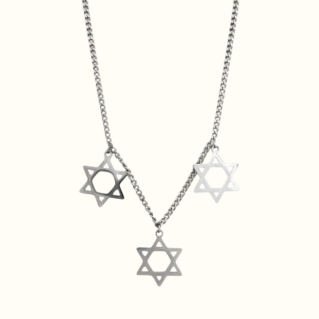 DUGO Star David Classic Trio Necklace featuring three silver-toned Star of David charms on a delicate metal chain.