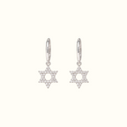 DUGO silver hoop earrings featuring delicate pavé Star of David charms with sparkling clear stones.