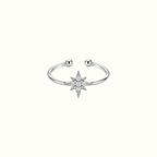 DUGO silver starburst ring with crystal accents and an adjustable open band design on a white background.