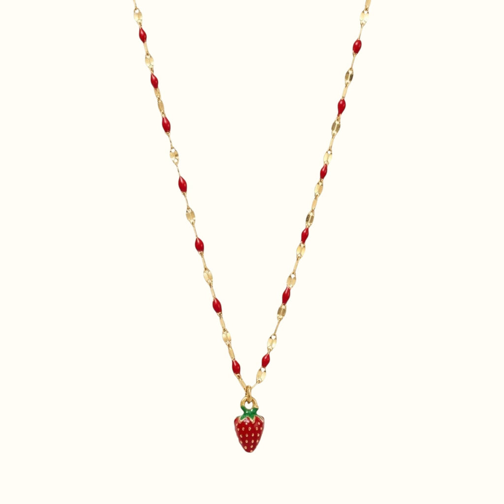 DUGO strawberry charm necklace with a red pendant on a gold-tone chain featuring small red bead accents