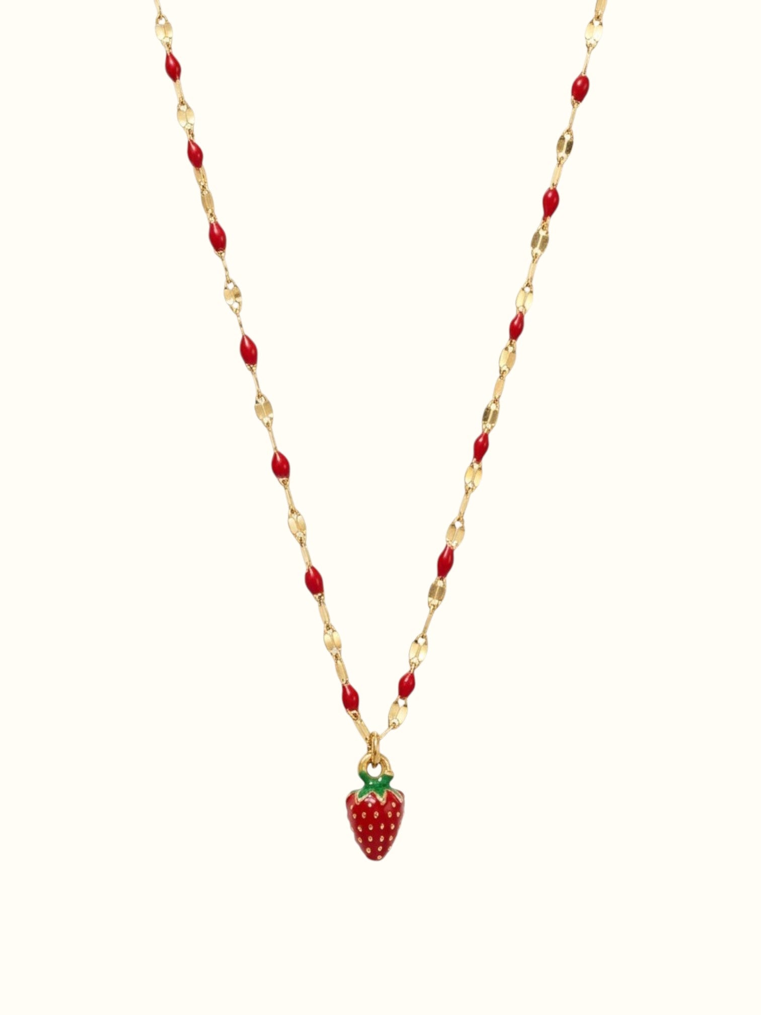 DUGO waterproof strawberry charm necklace in 18K gold filled stainless steel with red enamel accents on a dainty chain.