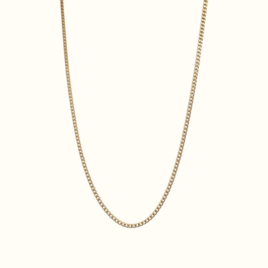 DUGO thin gold curb chain necklace with delicate interlocking links for everyday layering.
