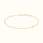 DUGO delicate gold chain anklet featuring small multicolor beads, perfect for summer beach wear.
