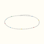 DUGO thin silver chain anklet featuring delicate multicolor beaded accents for a playful summer look.