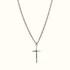 DUGO Cross Tiny necklace featuring a minimalist silver-tone cross pendant on a delicate curb chain